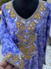 Amal Mukhwar (L)