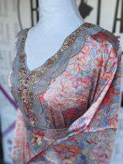 Amourati Mukhawar (L)