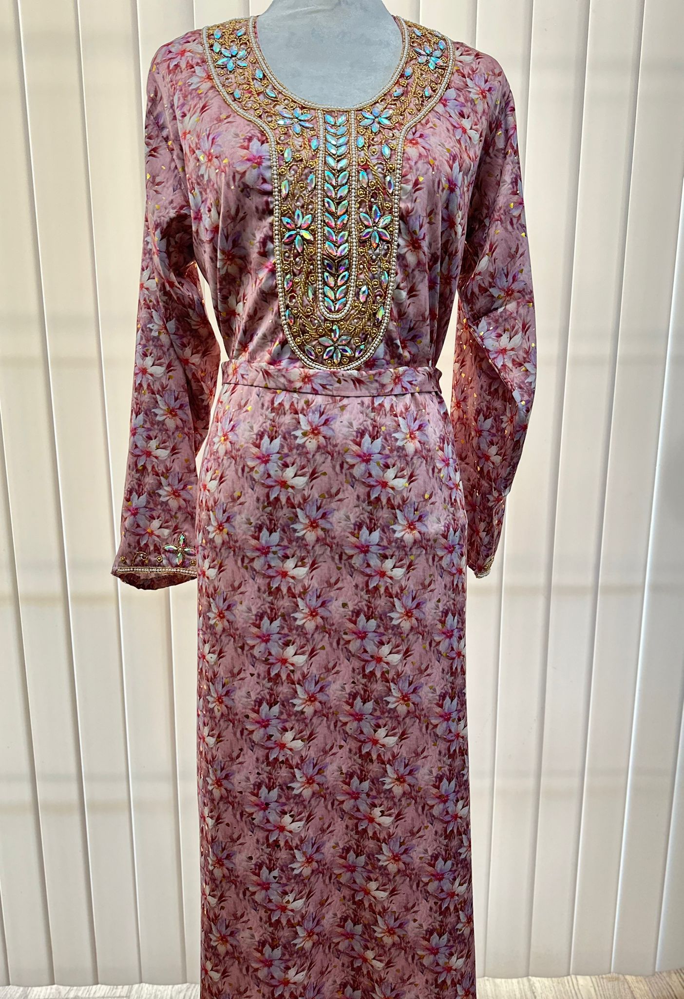 Israa Mukhwar (L) 56