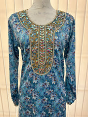 Israa Mukhwar (L) 56