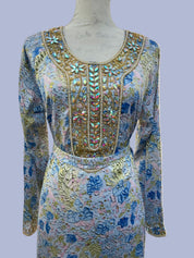 Israa Mukhwar (L) 56