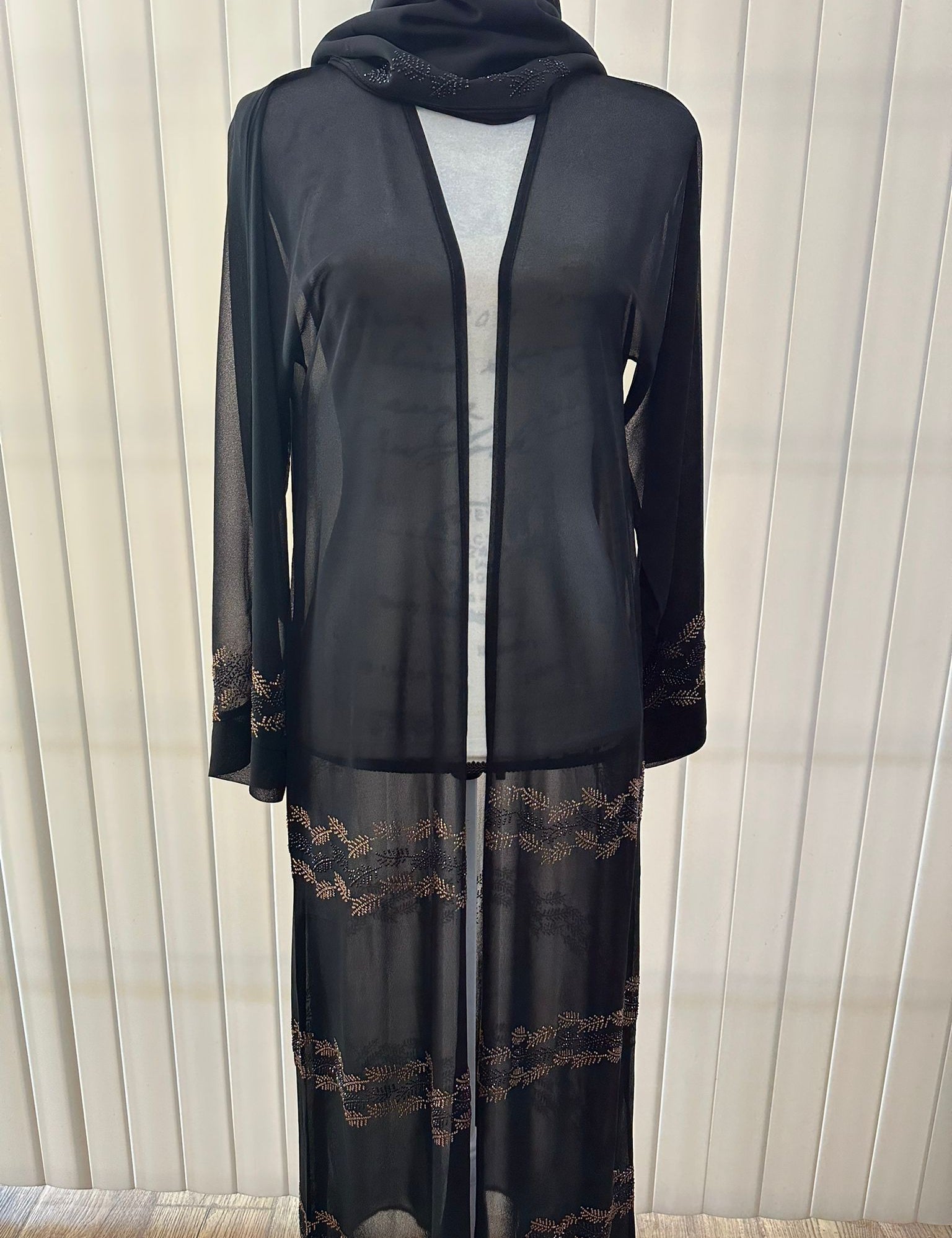 Maysara_chiffonn_abaya_black_and_gold.jpg