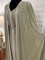 Thuraya Kuftan