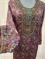 Israa Mukhwar (L) 56